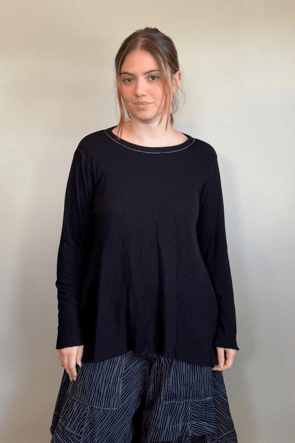 North Star Base by gertie 1153 Long Angle Tee, a relaxed long-sleeve A-line slub-knit top with a wide round neckline and flowing hem, shown in Mustard, Black, and Dusty Denim.