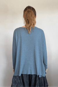 North Star Base by gertie 1153 Long Angle Tee, a relaxed long-sleeve A-line slub-knit top with a wide round neckline and flowing hem, shown in Mustard, Black, and Dusty Denim.