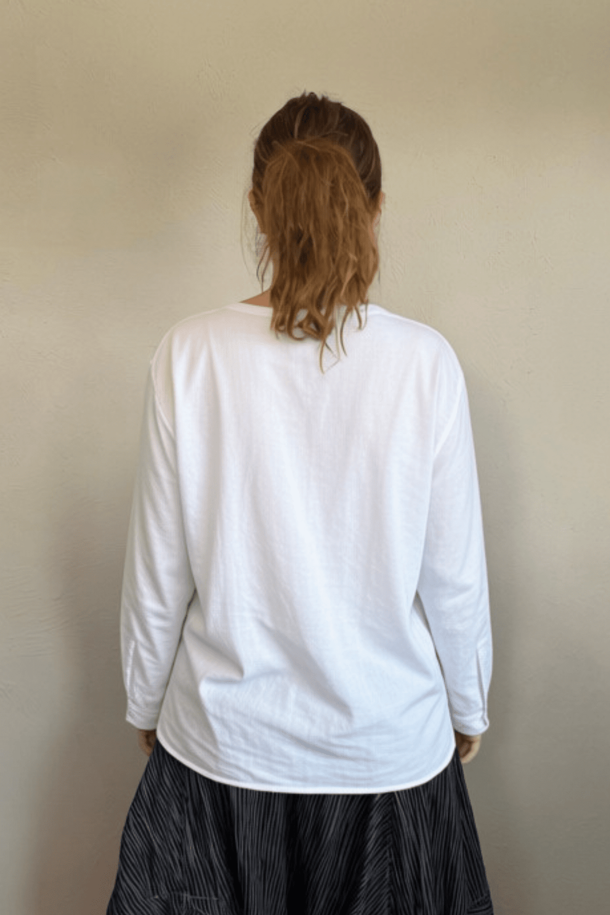 North Star Base by gertie 1449 Beach Tee, a relaxed double-layer long-sleeve slub-knit top with dropped shoulders and a wide crew neckline, shown in Black, Olive, and Chalk.