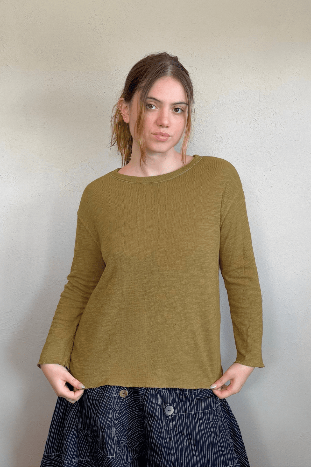 North Star Base by gertie 1449 Beach Tee, a relaxed double-layer long-sleeve slub-knit top with dropped shoulders and a wide crew neckline, shown in Black, Olive, and Chalk.