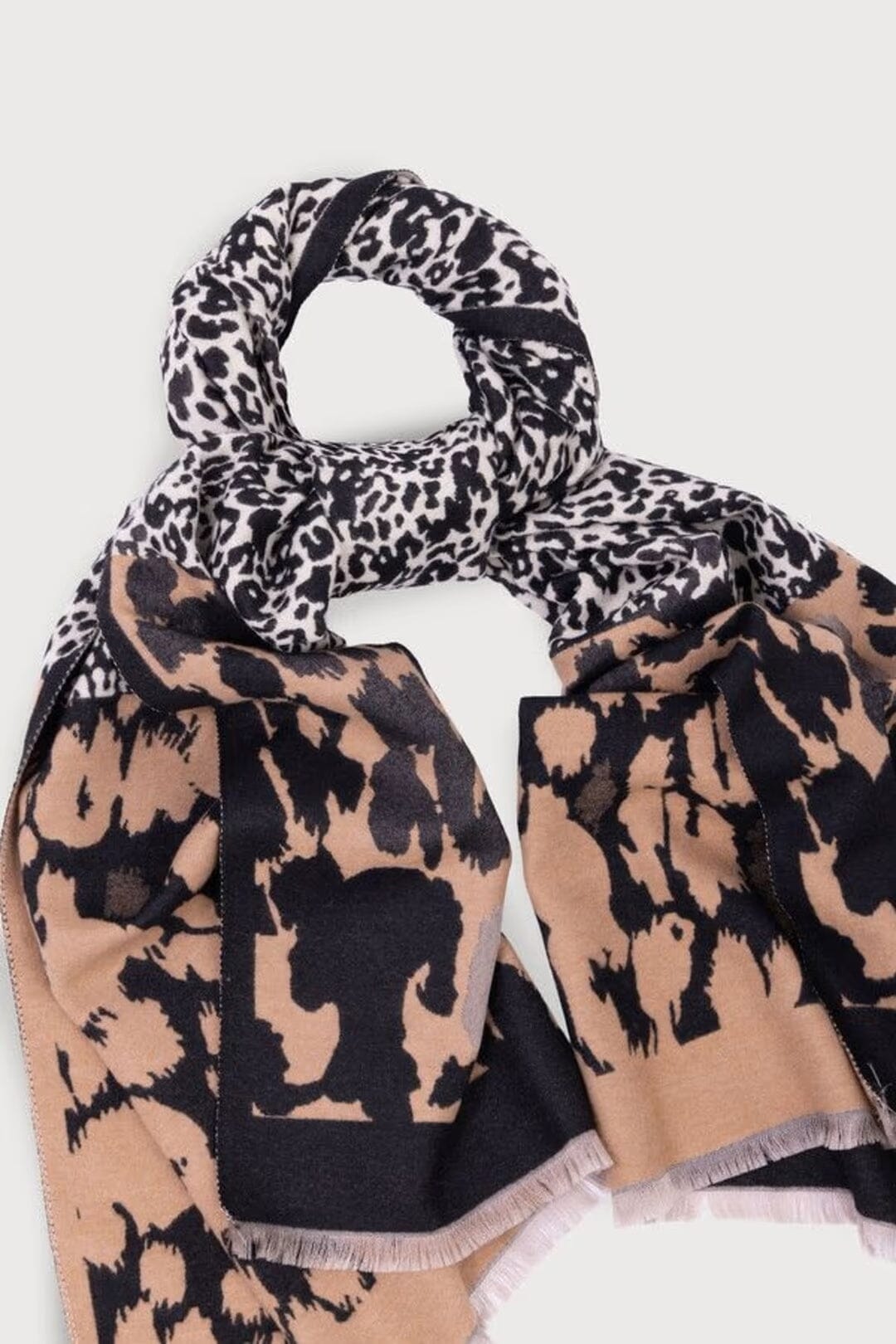 Saachi mixed animal print reversible scarf in black cream and camel