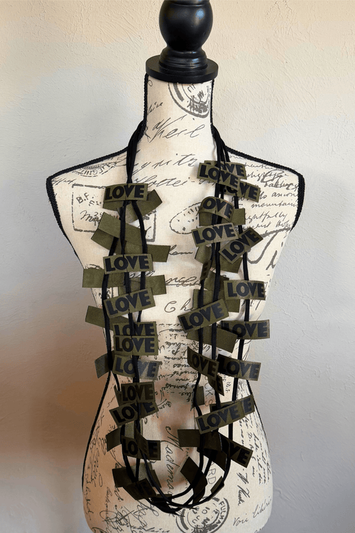 Jianhui 3 Strand Love Ribbon Necklace shown in Charcoal and Olive, styled long and doubled