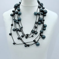 3 Strand Faux Pearls On Rubber