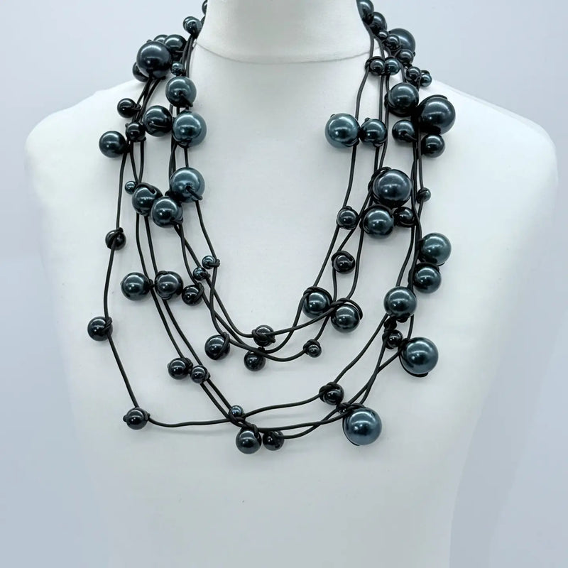 3 Strand Faux Pearls On Rubber