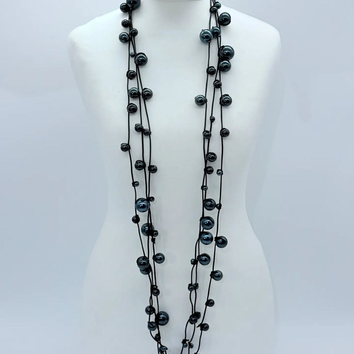 3 Strand Faux Pearls On Rubber