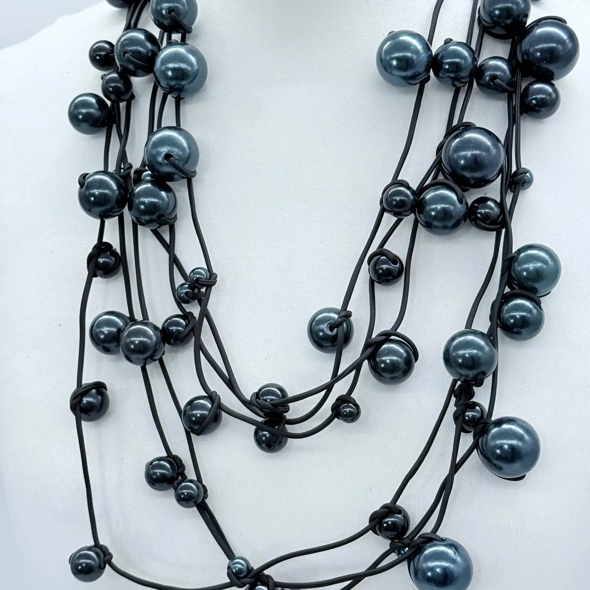 3 Strand Faux Pearls On Rubber
