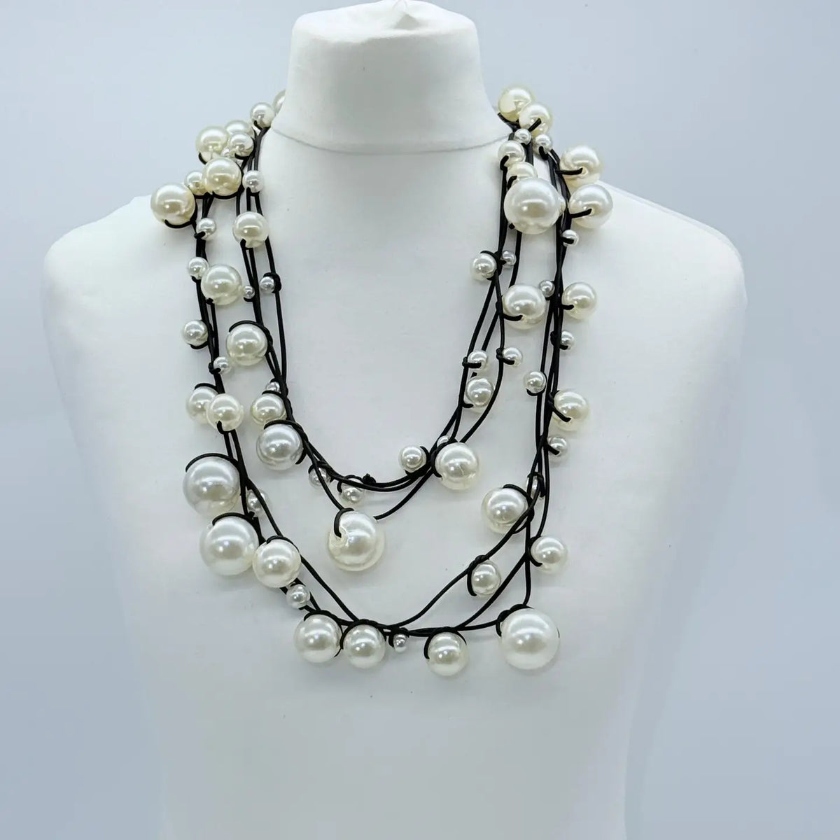 3 Strand Faux Pearls On Rubber