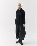 Kedziorek 5311 charcoal black coated cotton cocoon midi skirt, front and side views showing sculptural panels