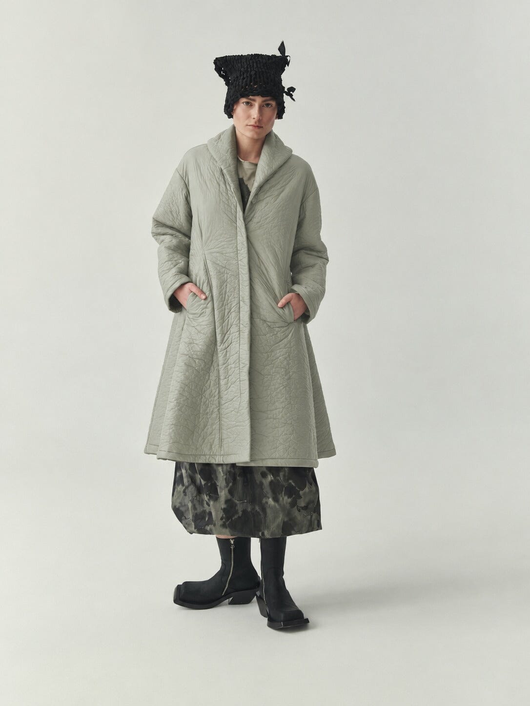 Kedziorek 5508 pale sage green A-line swing coat with sculptural collar and softly crinkled texture