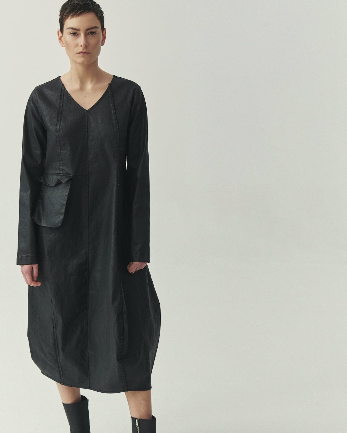 Kedziorek 5517 black waxed cotton midi cocoon dress, front side and back views with architectural seaming