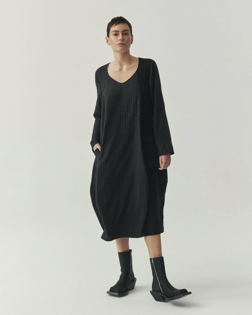 Kedziorek 5527 charcoal and black pinstripe cocoon midi dress with asymmetrical panels and patch pocket