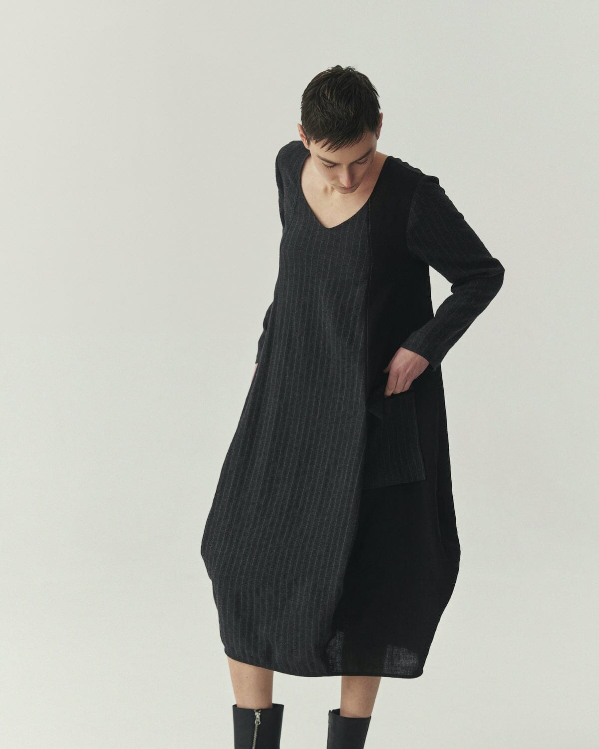 Kedziorek 5527 charcoal and black pinstripe cocoon midi dress with asymmetrical panels and patch pocket