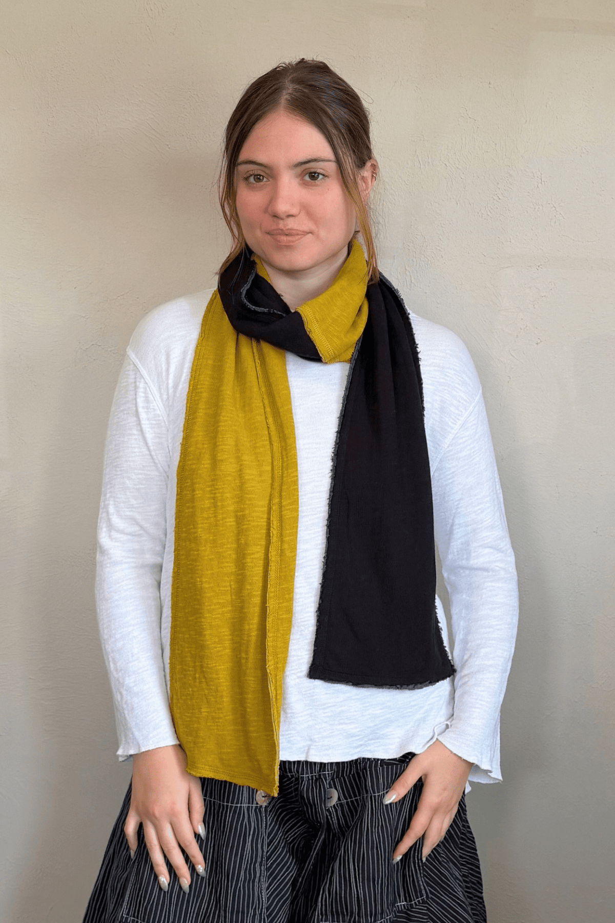 North Star Base by gertie 8030 rectangular two-tone scarf in Black/Chalk, tonal Olive, Black/Denim, and Black/Mustard color combinations.