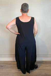 Model wearing the black Kozan Dawn sleeveless wide-leg jumpsuit, shown from front and back.
