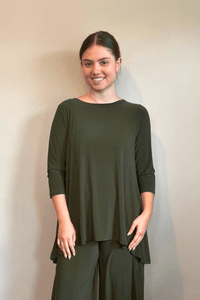 Kozan Dima Tunic in Thyme, a relaxed A-line tunic with three-quarter sleeves and a high-low hem.