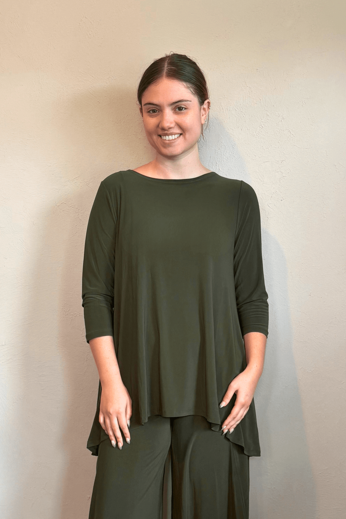 Kozan Dima Tunic in Thyme, a relaxed A-line tunic with three-quarter sleeves and a high-low hem.