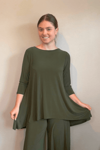 Kozan Dima Tunic in Thyme, a relaxed A-line tunic with three-quarter sleeves and a high-low hem.