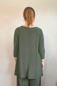 Kozan Dima Tunic in Thyme, a relaxed A-line tunic with three-quarter sleeves and a high-low hem.
