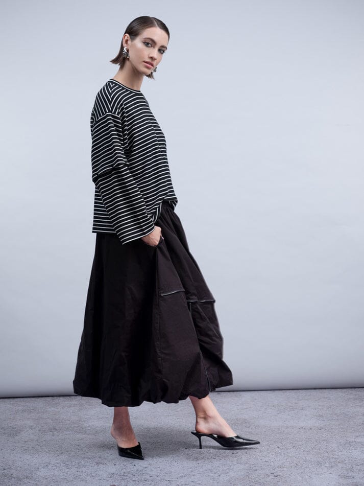 Haako H2005 black midi bubble skirt with angled zipper details and ring pulls