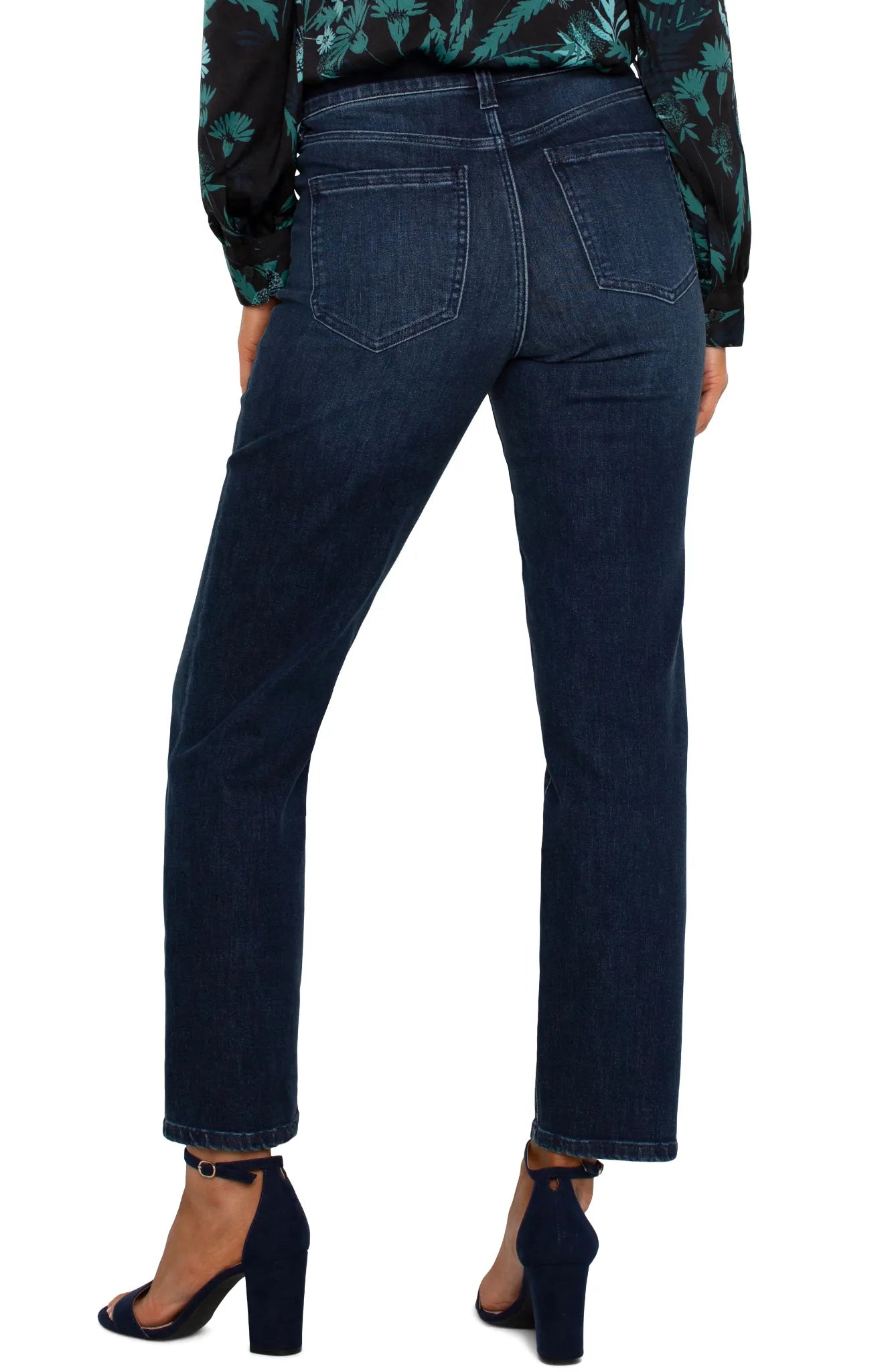 Dark indigo slim-straight jeans in the Warner Lake wash with a mid-rise waist, belt loops, five-pocket styling, zip fly with logo button closure, subtle fading, and a cropped ankle-length silhouette.