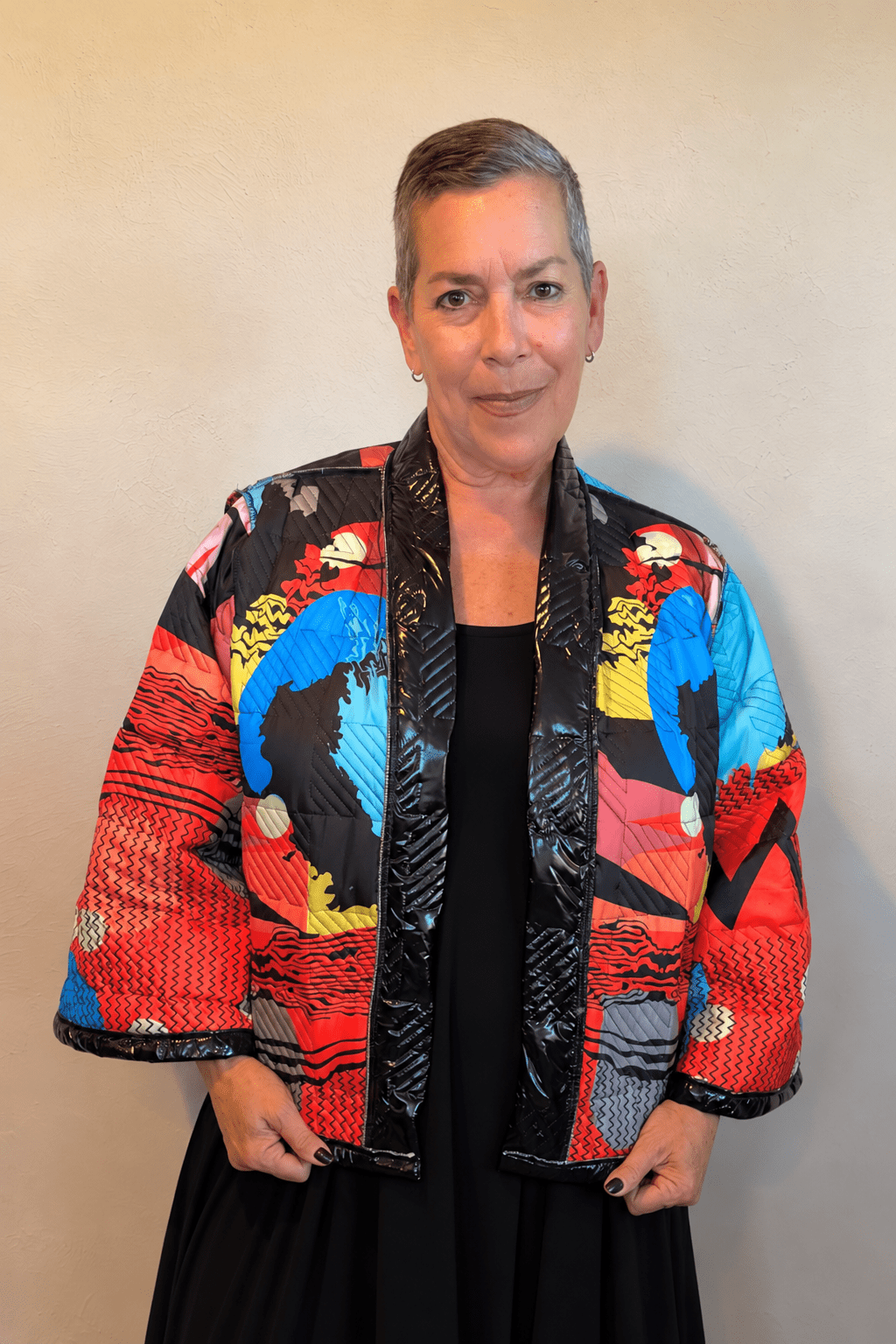 Heydari NOJS reversible short quilted jacket in multicolor abstract print and glossy black checkerboard