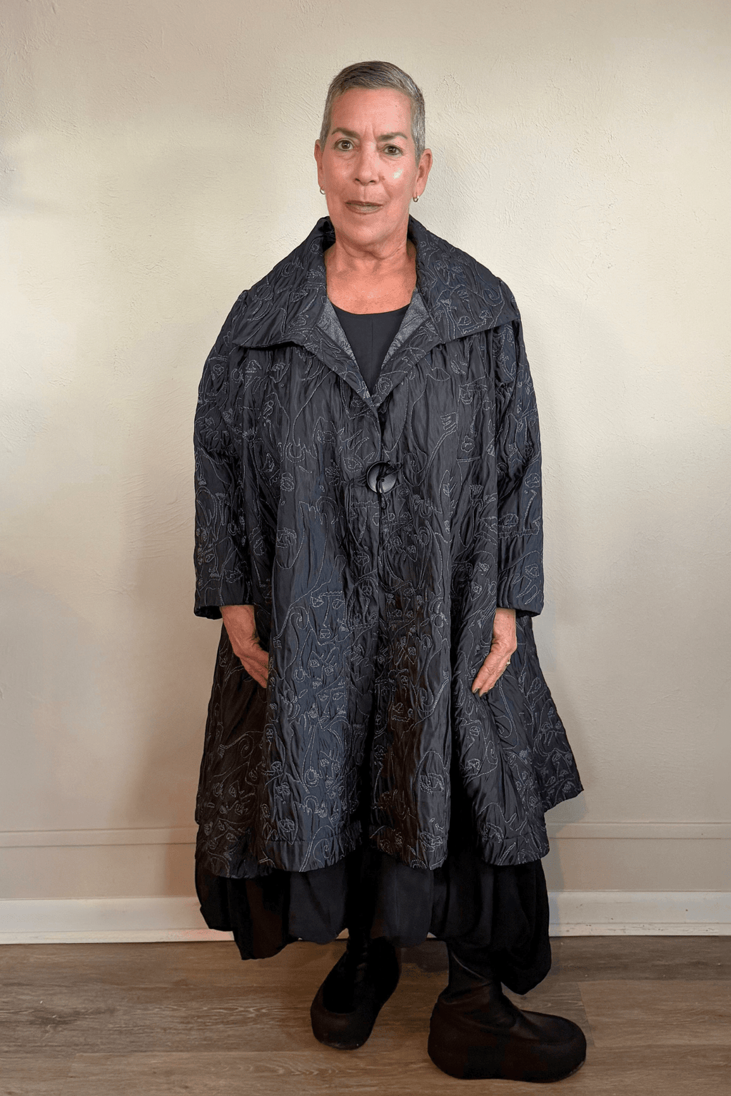 Heydari NOJ5 Face Jacket in charcoal with contrasting embroidered abstract faces, front, side and back views