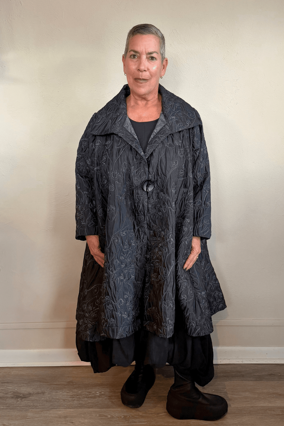 Heydari NOJ5 Face Jacket in charcoal with contrasting embroidered abstract faces, front, side and back views