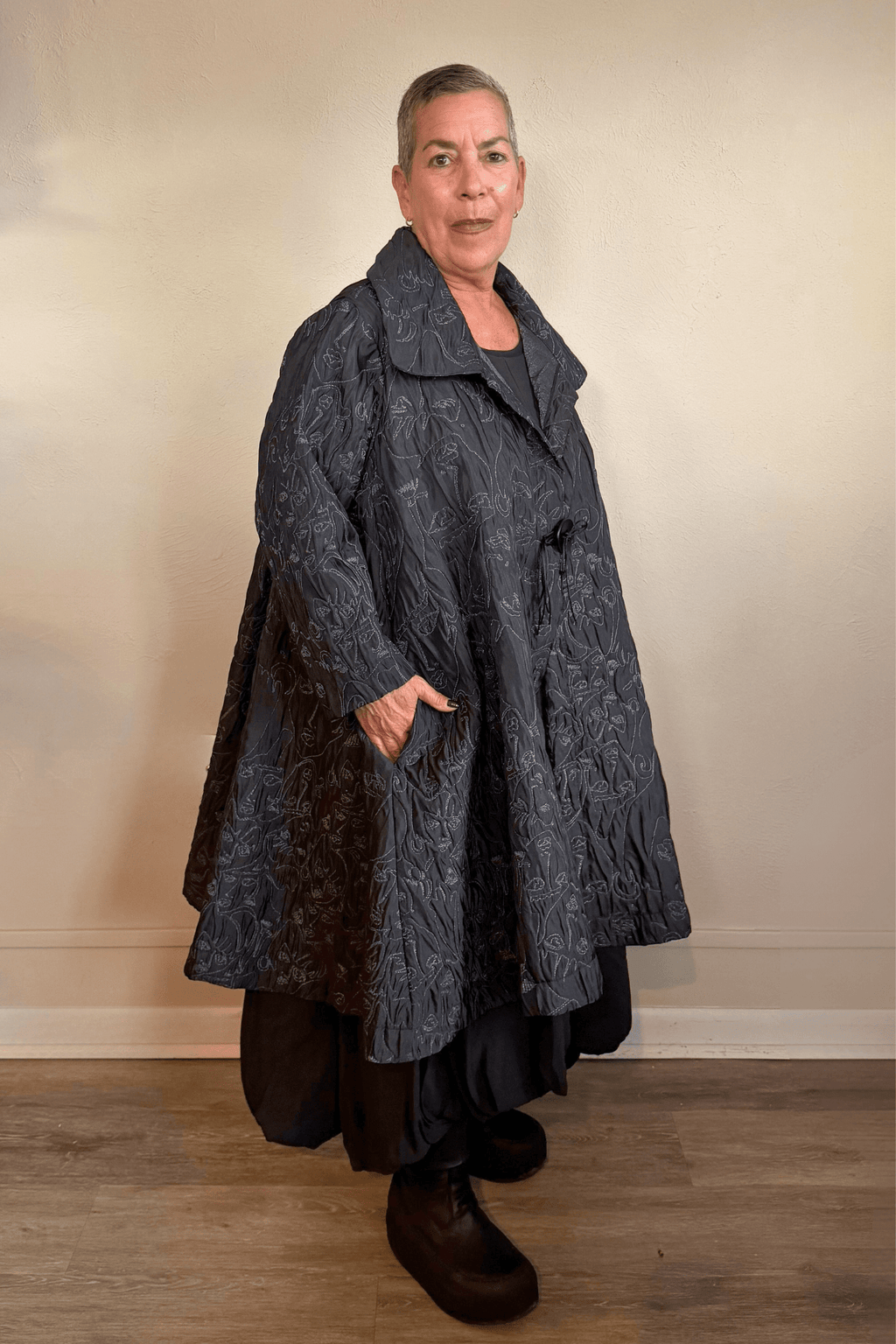 Heydari NOJ5 Face Jacket in charcoal with contrasting embroidered abstract faces, front, side and back views