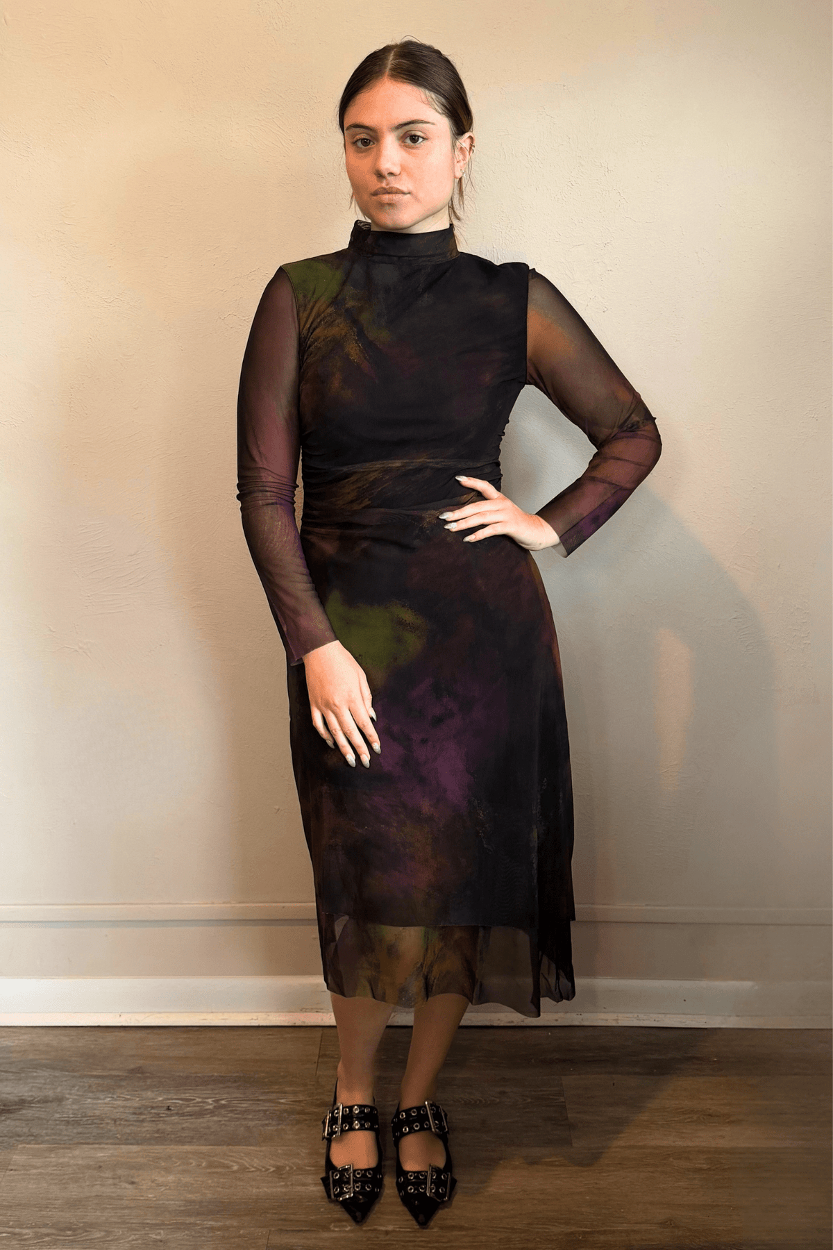 Kozan SH-11058 Mack Dress in Loden, shown from front and back with abstract painterly print, sheer long sleeves, high neckline, and layered asymmetrical midi hem.