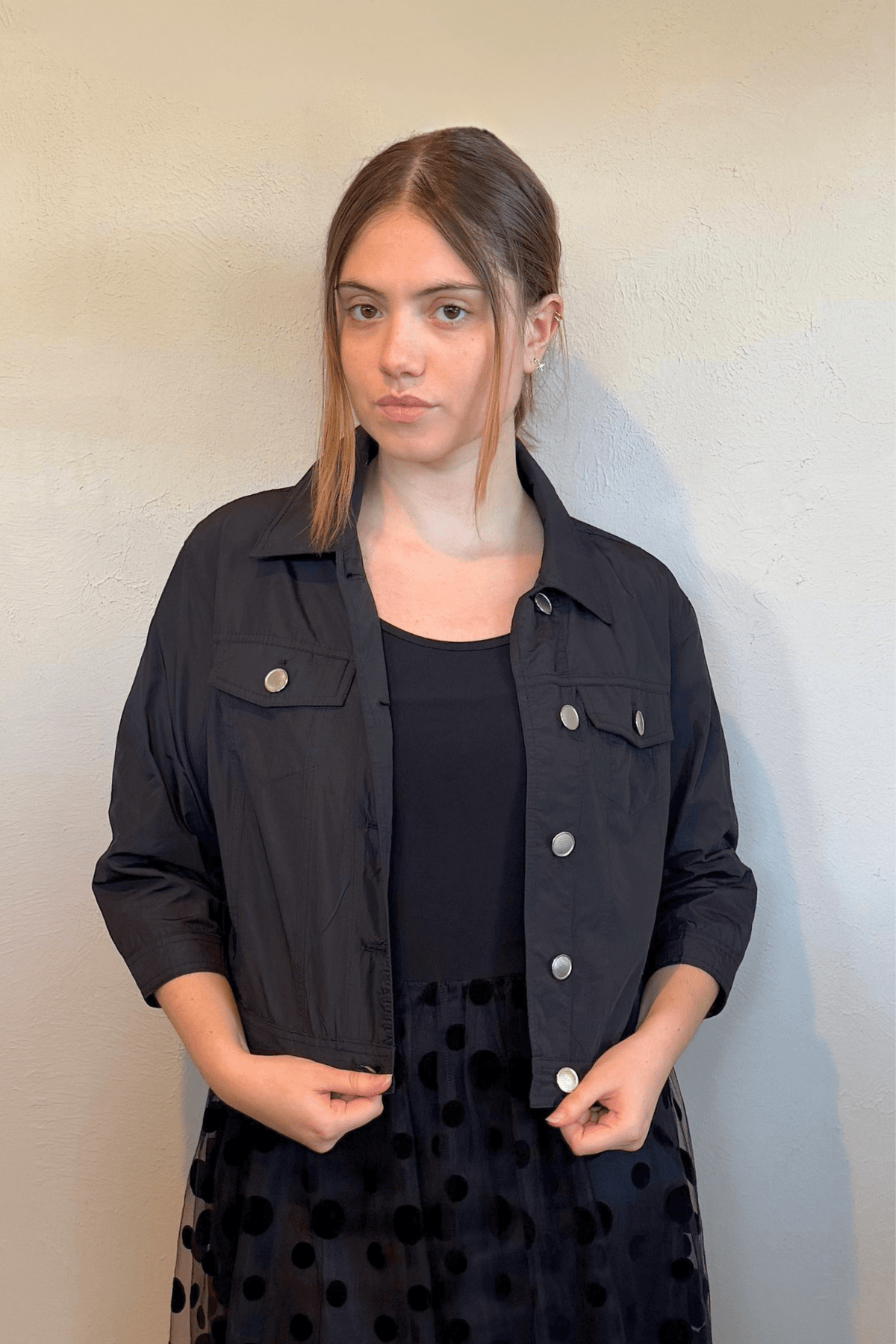 Kozan Amira Jacket in Jot Black, front, back and side details, styled with the Cinderella Dress