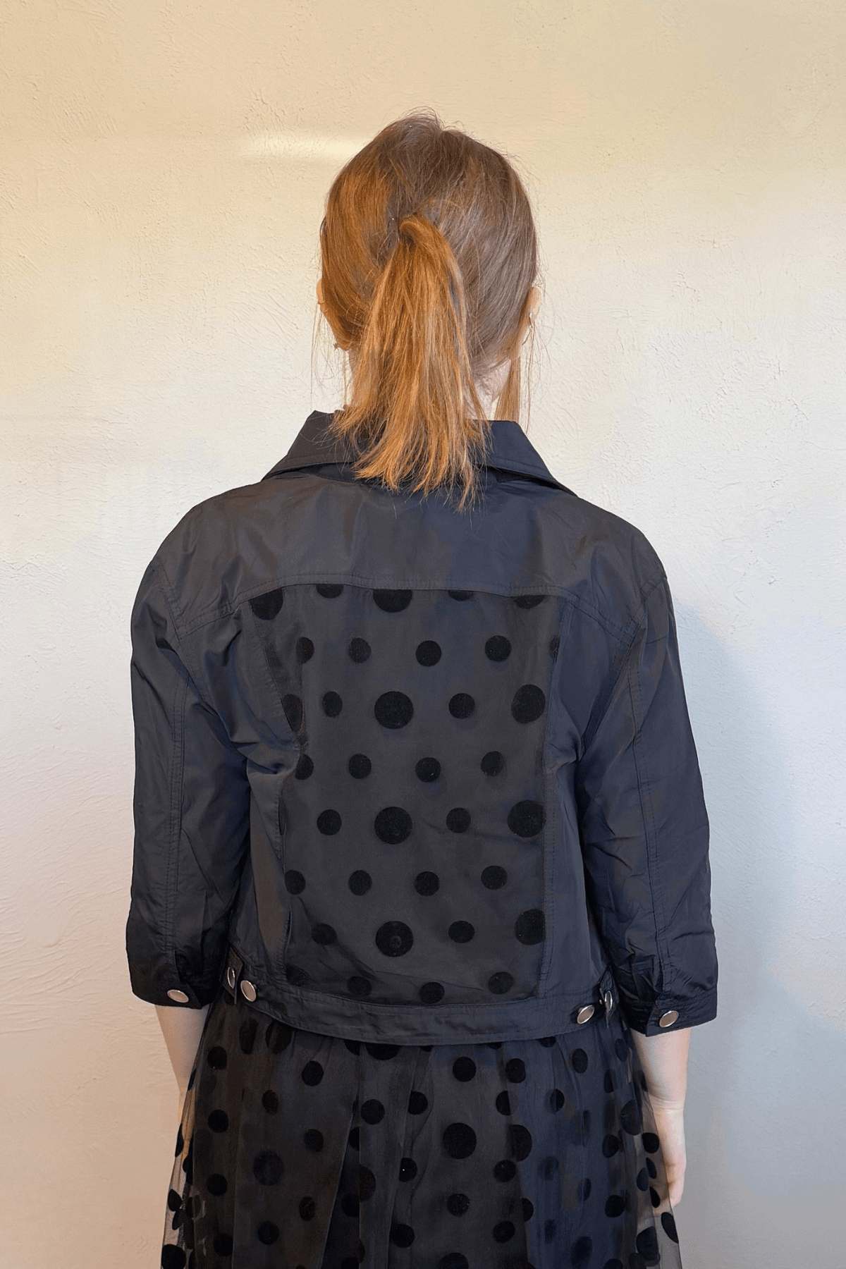 Kozan Amira Jacket in Jot Black, front, back and side details, styled with the Cinderella Dress