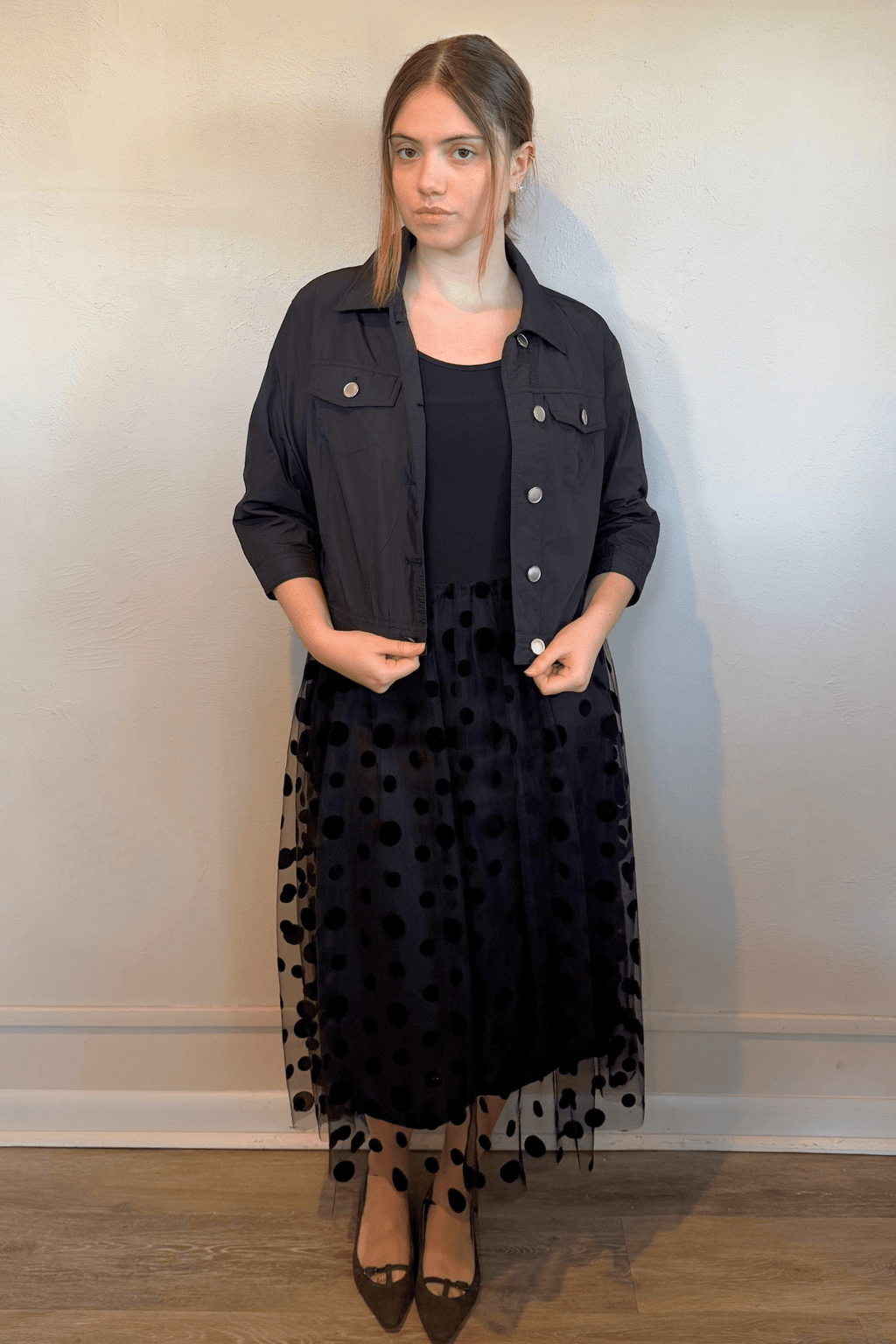 Kozan Amira Jacket in Jot Black, front, back and side details, styled with the Cinderella Dress