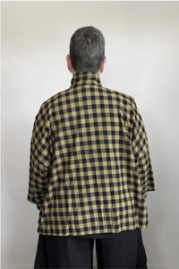 Gertie's 2165B Big Shirt in olive-and-black check cotton flannel, with a relaxed boxy silhouette, point collar, three-quarter sleeves, metal snap front, and bright yellow contrast placket trim.