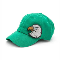 Green distressed baseball cap with a curved brim and a rhinestone eagle embellishment on the front; adjustable back strap with metal hardware.