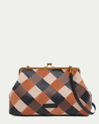 American Leather Co. Grace Oversized Clutch with woven leather patchwork, vintage-inspired kisslock frame, and removable crossbody strap.