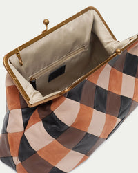 American Leather Co. Grace Oversized Clutch with woven leather patchwork, vintage-inspired kisslock frame, and removable crossbody strap.