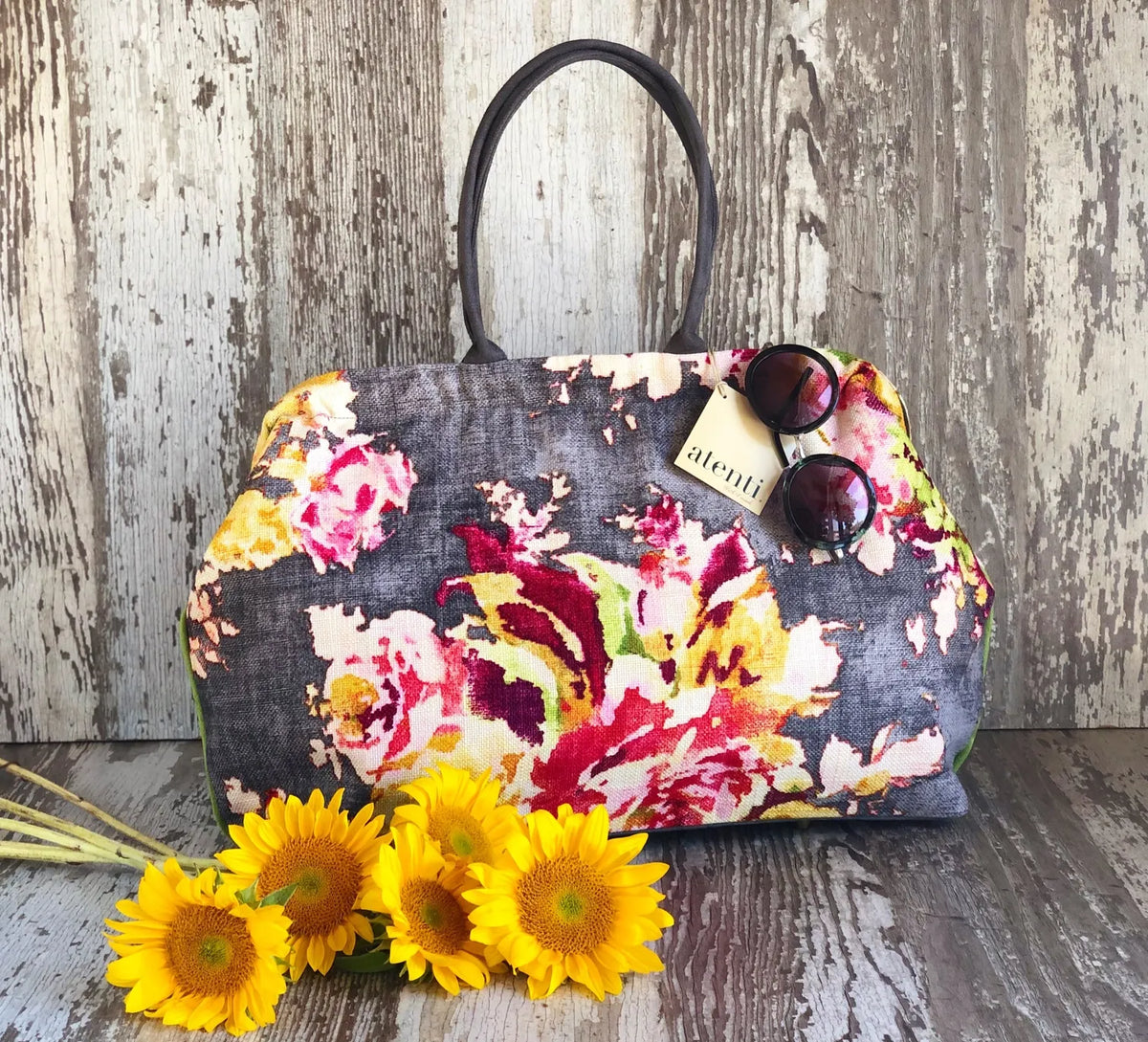 Atenti Blossom Grey Pioneer handbag with oversized floral print, dark double handles, and green side piping