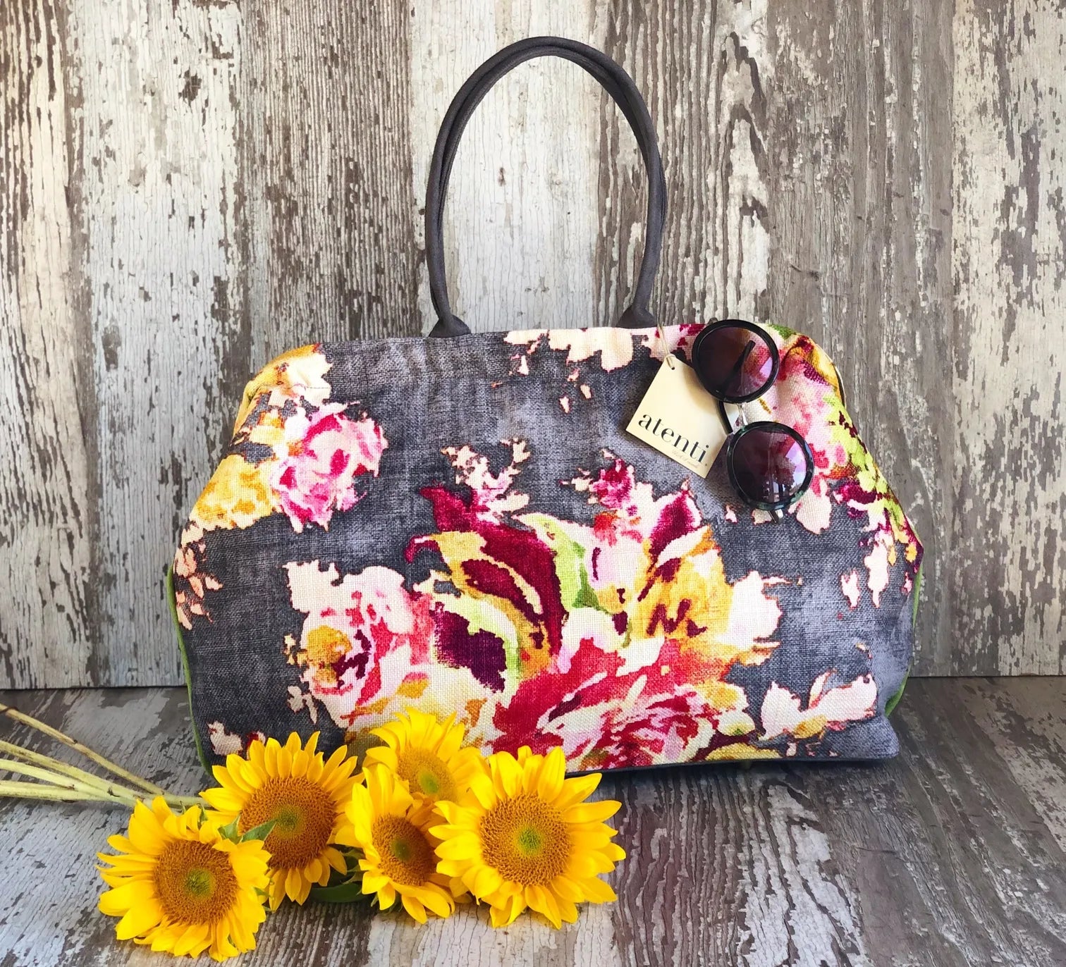 Atenti Blossom Grey Pioneer handbag with oversized floral print, dark double handles, and green side piping