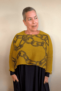 Paper Temples Heather Chain Pullover Sweater in mustard with charcoal chain print, front and back views