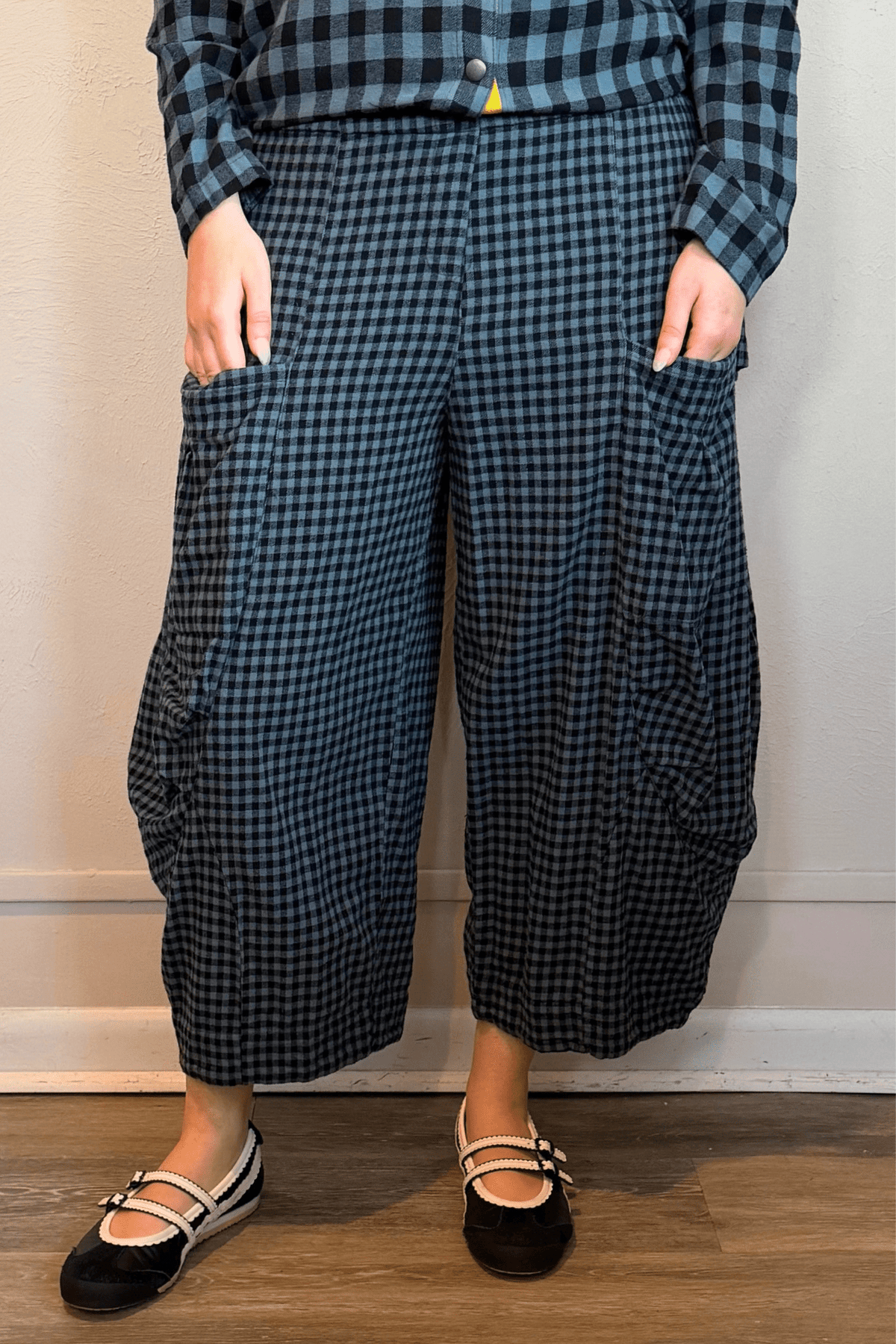 Gertie's 5069C Double Pocket Pant in Dusty Denim Check, a blue-and-black small-check cropped barrel-leg pant with oversized front patch pockets.