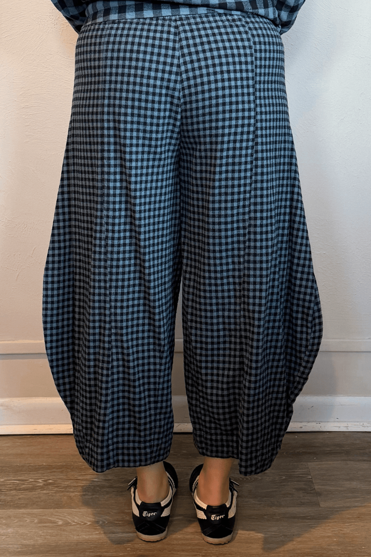 Gertie's 5069C Double Pocket Pant in Dusty Denim Check, a blue-and-black small-check cropped barrel-leg pant with oversized front patch pockets.