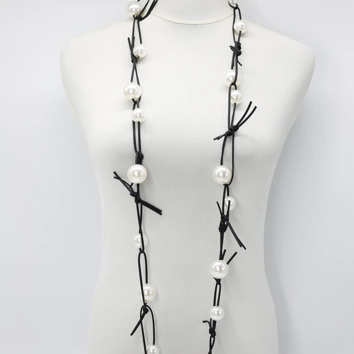 Faux Pearls On Leatherette