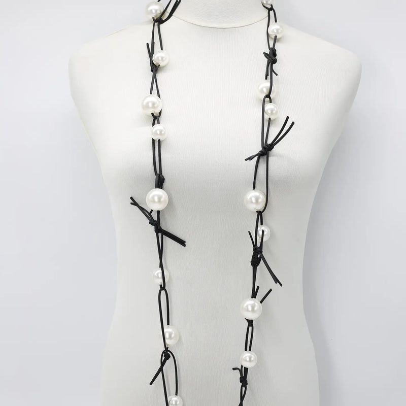 Faux Pearls On Leatherette
