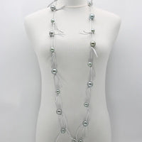 Faux Pearls On Leatherette