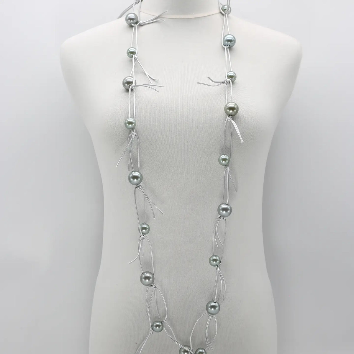 Faux Pearls On Leatherette