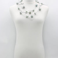 Faux Pearls On Leatherette