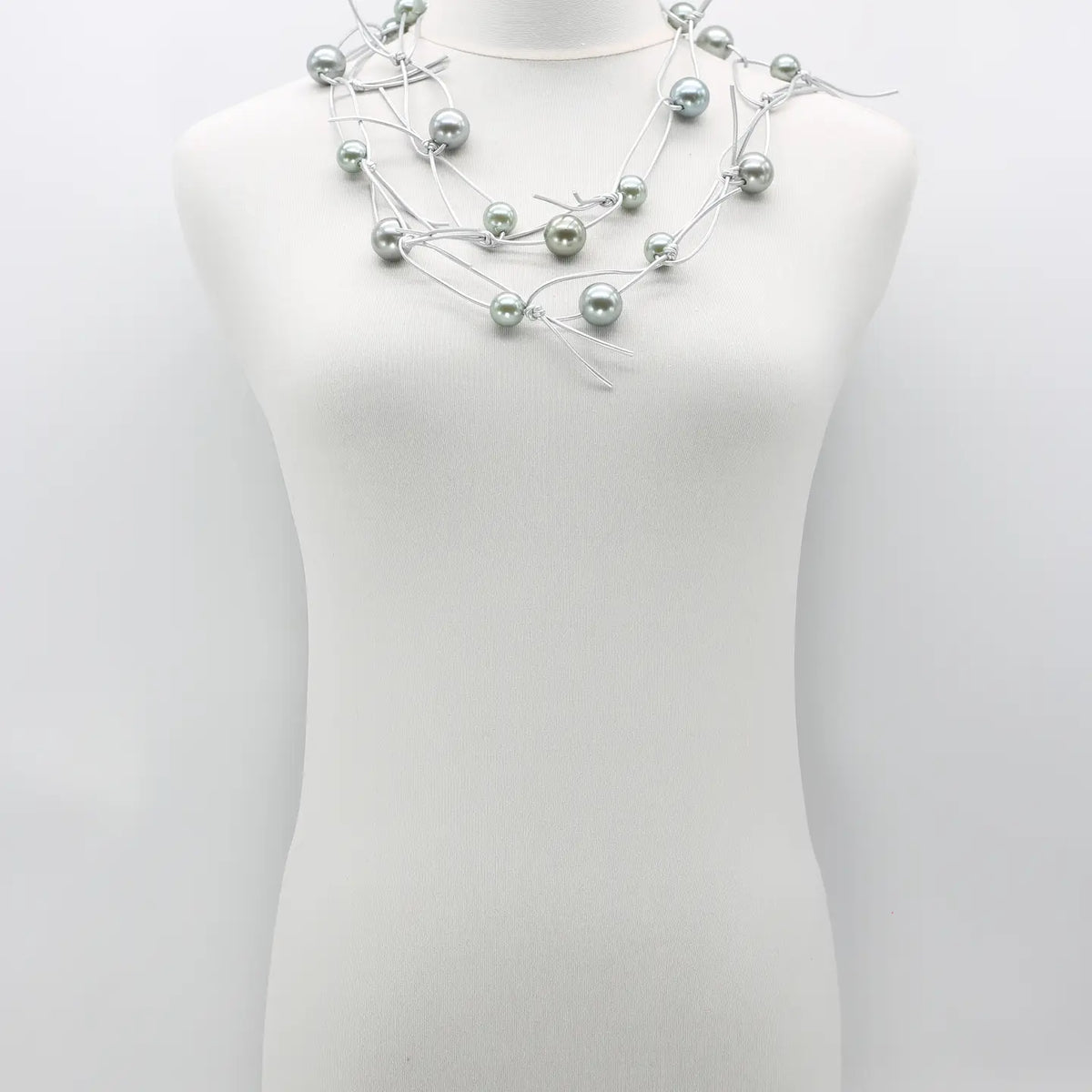 Faux Pearls On Leatherette