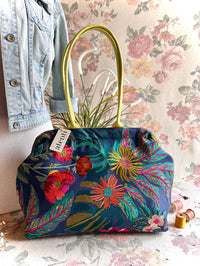 Atenti Floral Molly handbag with embroidered botanical design, chartreuse handles and trim, and organized lined interior