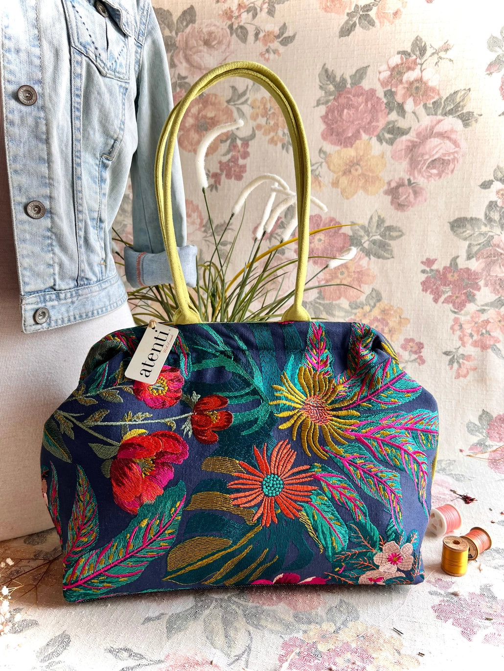 Atenti Floral Molly handbag with embroidered botanical design, chartreuse handles and trim, and organized lined interior