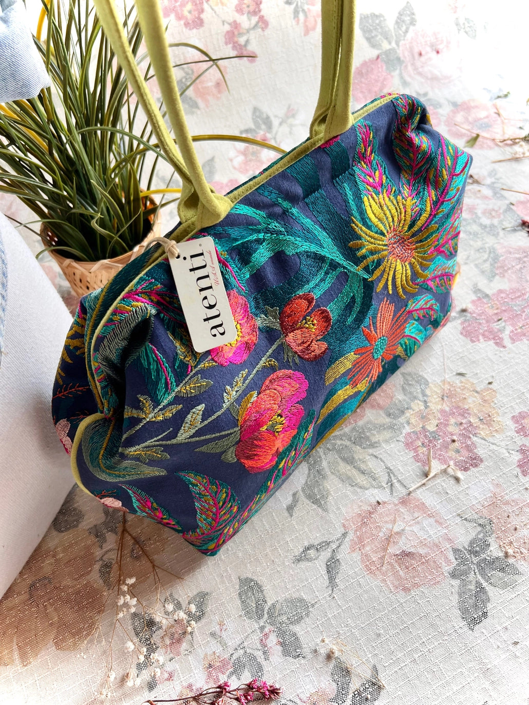 Atenti Floral Molly handbag with embroidered botanical design, chartreuse handles and trim, and organized lined interior